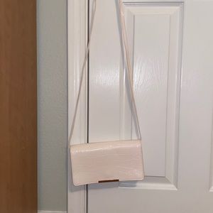 White snakeskin purse